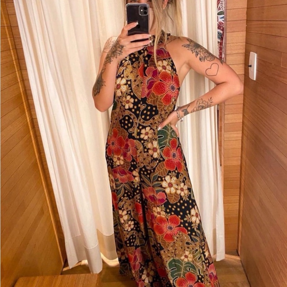 Farm jumpsuit with floral leopard print.